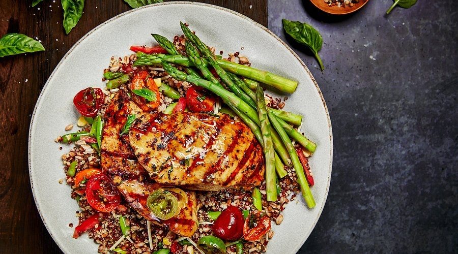 Wood-grilled chicken over heirloom grains