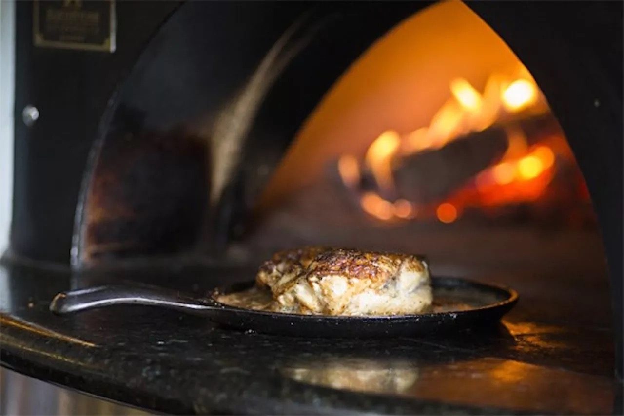 Chicken roasting in the wood-fired oven