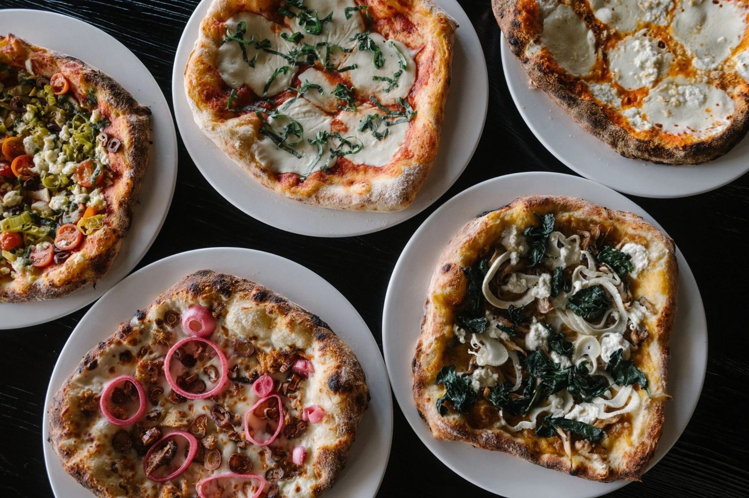 Wood-fired pizzas fresh from the oven